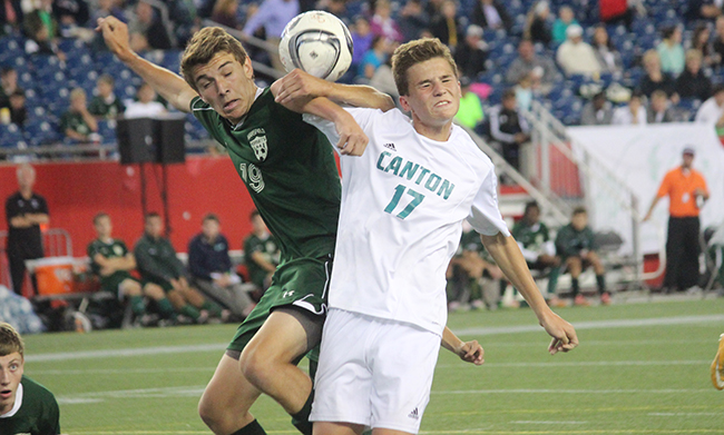 Mansfield's Jack Reilly and Canton's Matas Leveckis go up for a header in the second half. (Ryan Lanigan/HockomockSports.com)