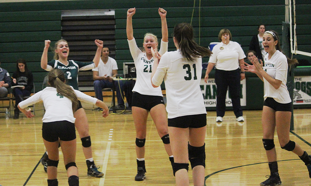 Canton celebrates after winning a long rally in the second set against Milton on Monday night. (Ryan Lanigan/HockomockSports.com)