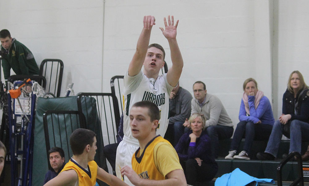 King Philip's Noah Goodwin releases a three point shot attempt in the first half against Barrington. (Ryan Lanigan/HOckomockSports.com)