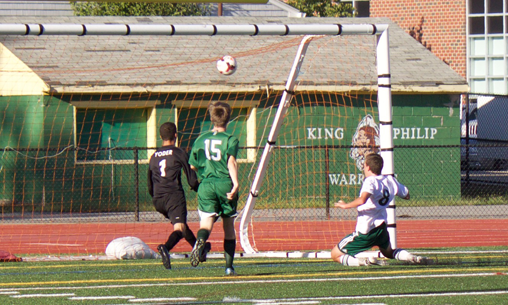 King Philip's Zac White (8) watches as his shot finds the back of the net for the lone goal. (Jaron May/HockomockSports.com